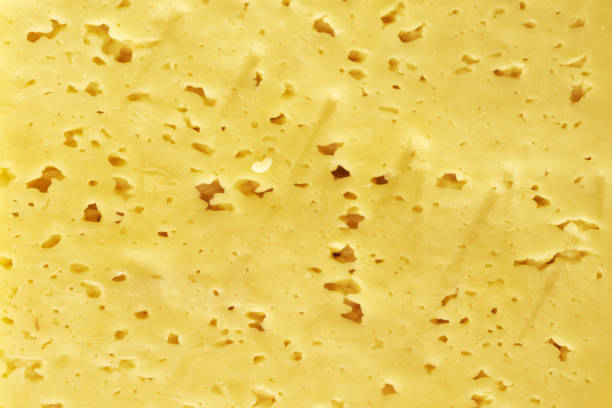 istock cut of fresh milk cheese close-up background backdrop 1420660827