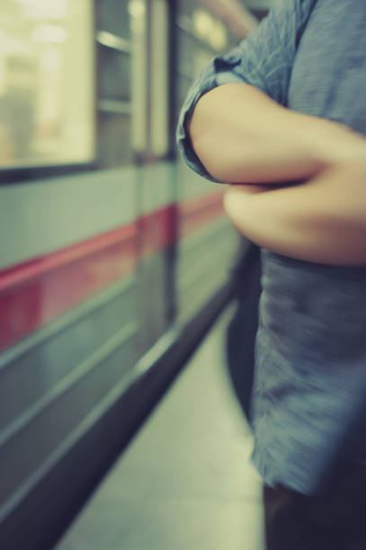 istock Blurry image of man hands in a subway 1420674631