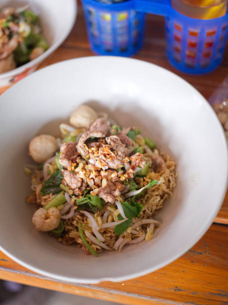 istock Thai Noodle beef is very delicious on wood table 1420678097