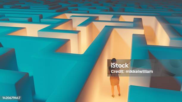 Woman Looking For At Way To Escape Maze Stock Photo - Download Image Now - Maze, Footpath, Decisions