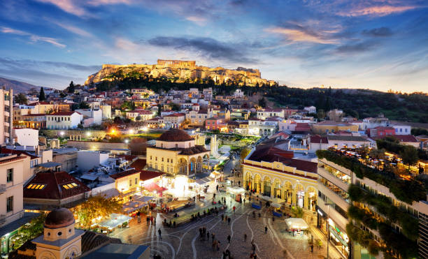 athens skyline with acropolis at night, greece - central greece imagens e fotografias de stock