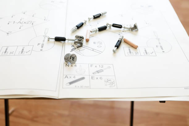 istock a hammer with instructions on how to assemble a gray writing. 1420692304
