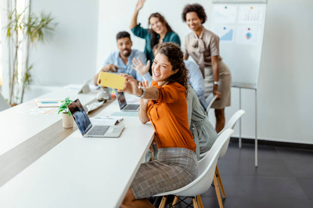 istock Selfie in corporate meeting with unity and happy workforce 1420696376