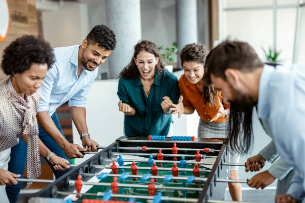 Colleagues Playing Table Football