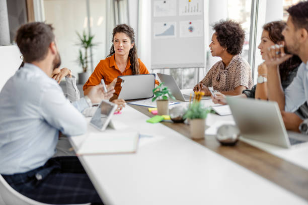 istock Businesspeople brainstorming in a modern office 1420697329