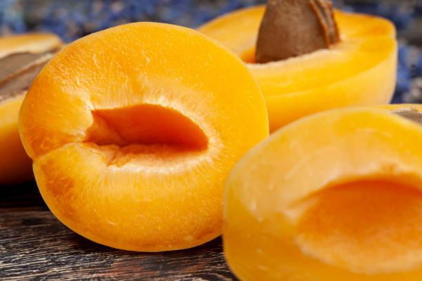 istock Ripe orange apricot cut into pieces 1420698696