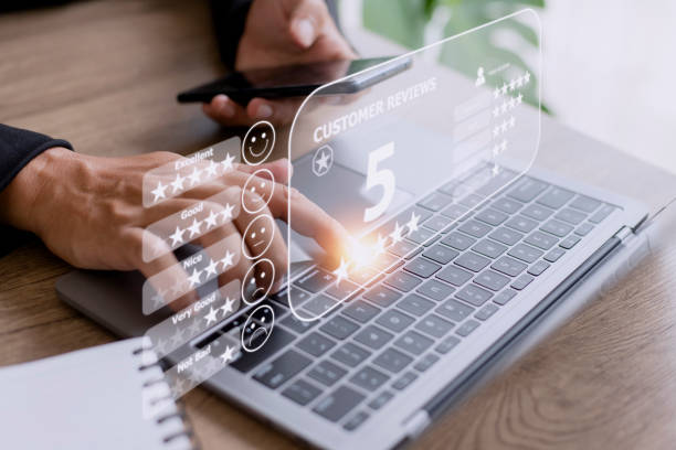 istock User gives rating to service experience on online application, Customer review satisfaction feedback survey concept, Customer can evaluate the quality of service leading to reputation ranking of the business. 1420699396