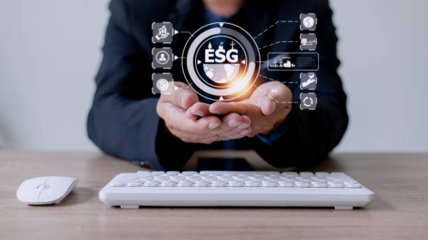 istock Businessman using a computer for analysis ESG environmental social governance business strategy investing concept. 1420699470