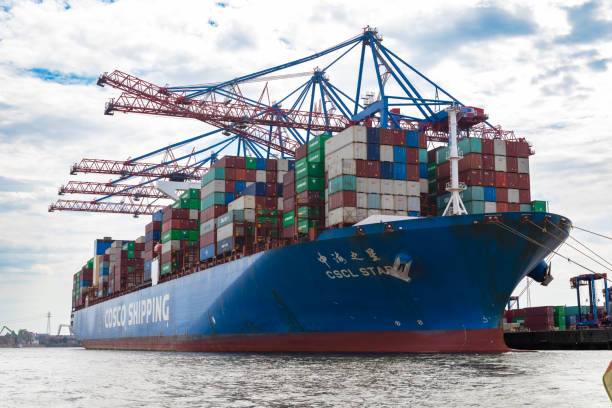 Hamburg, Germany - July 25th, 2022, Loading container ship COSCO SHIPPING in Hamburg Alsterhafen, view from the front.