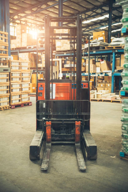 istock forklift, Shelves and racks with pallets in distribution warehouse interior 1420716137