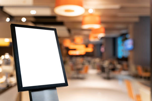 istock Advertisement concept with blank white billboard, display floor stand in banner advertising concept in entrance of hotel. 1420716200