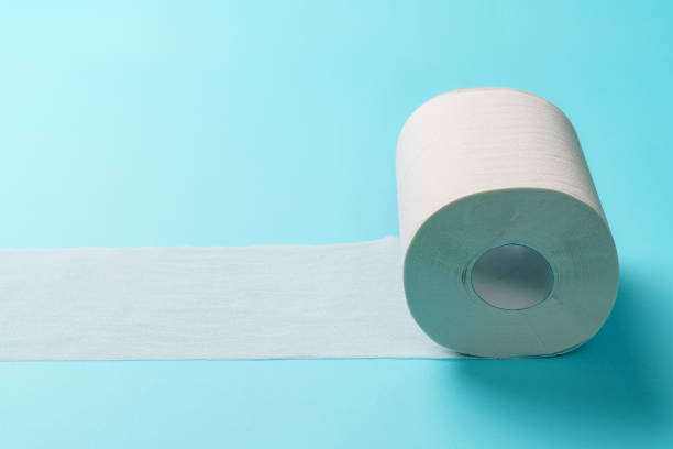 istock Toilet paper isolated on color background 1420717228