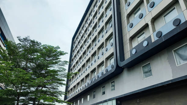 istock unique hotel building with cloudy sky background 1420717861