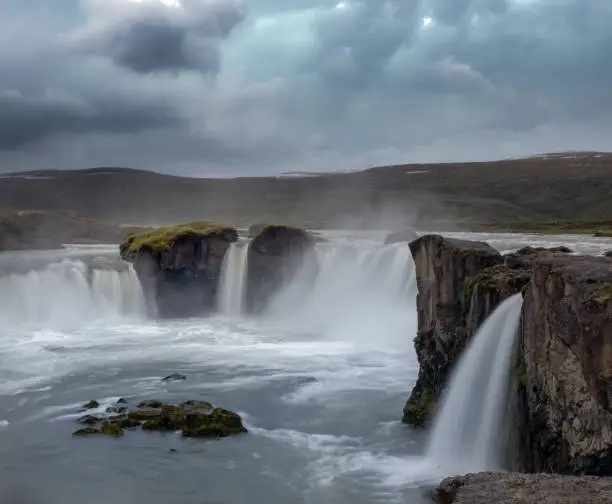 Photo of GoÃ°afoss waterfall in northern Iceland, located along the country's main ring road. The water of the river SkjÃ¡lfandafljÃ³t falls from a height of 12 metres over a width of 30 metres.