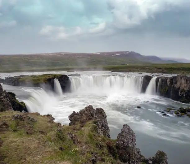 Photo of GoÃ°afoss waterfall in northern Iceland, located along the country's main ring road. The water of the river SkjÃ¡lfandafljÃ³t falls from a height of 12 metres over a width of 30 metres.