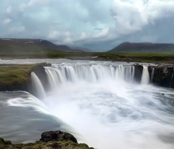 Photo of GoÃ°afoss waterfall in northern Iceland, located along the country's main ring road. The water of the river SkjÃ¡lfandafljÃ³t falls from a height of 12 metres over a width of 30 metres.