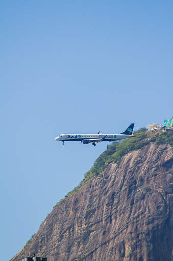Airplanes arriving at Santos Dumont Airport in Rio de Janeiro, Brazil - October 14, 2022: Airplanes flying over the Flamengo Landfill, heading to Santos Dumont Airport in Rio de Janeiro.