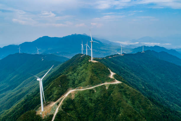 istock Wind power equipment at sunset on the mountain 1420723130