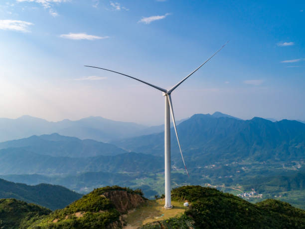 istock Wind power equipment at sunset on the mountain 1420723879