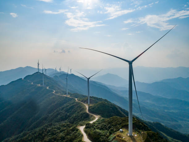 istock Wind power equipment at sunset on the mountain 1420723940