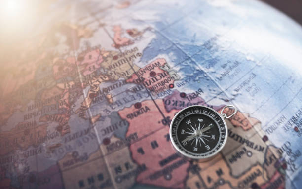 istock compass on the map background.Travel Geographic Navigation Concept Background 1420726289
