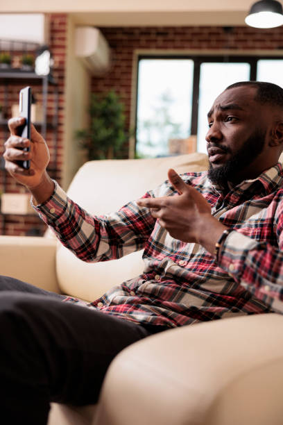 istock Adult attending online videocall conference 1420727739