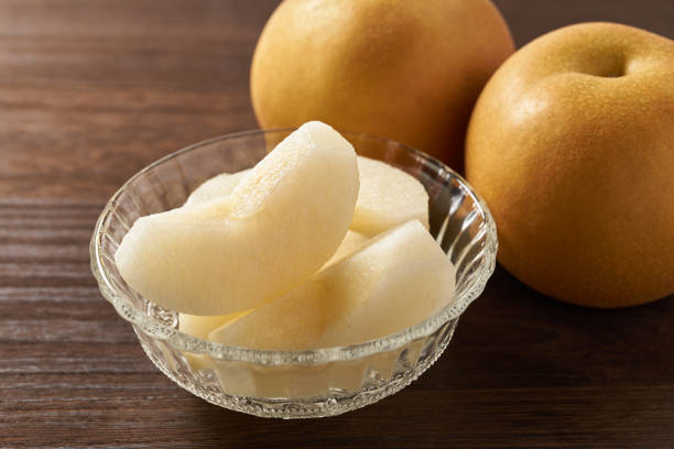 istock Japanese pear on wooden background 1420730417