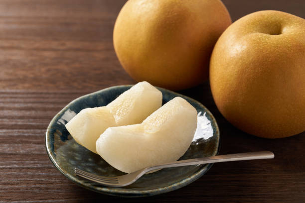 Japanese pear on wooden background