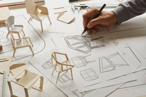 istock Designer sketching drawing design development product plan draft chair armchair Wingback Interior furniture prototype manufacturing production. designer studio concept . 1420734162