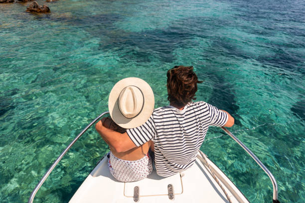 istock Couple sitting on the boat deck 1420734224