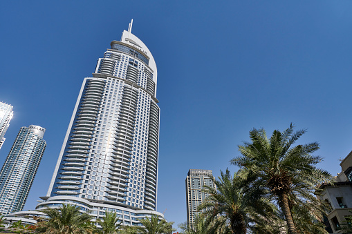 Dubai, United Arab Emirates - June 03, 2022: the luxury hotel Address Downtown on a sunny day.