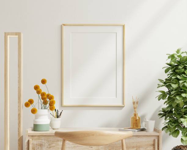 istock Poster mockup with vertical white frame in working room interior background. 1420739960