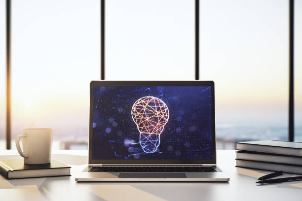 istock Modern computer monitor with creative light bulb hologram, research and development concept. 3D Rendering 1420741256