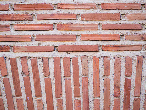 old brick wall of a historic building. Texture and backgrounds hd image