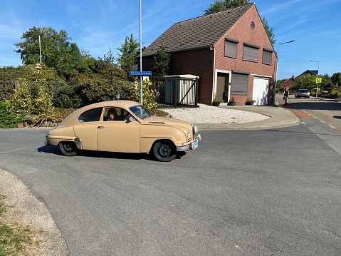 Hulsberg, Netherlands - September 04, 2022.   Saab 961970 on the road during route of classical collector cars in  the country.