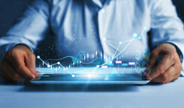 istock Virtual hologram of statistics, graph and chart.Business strategy development and growing growth plan. Investment of growth on currency rate. 1420746750