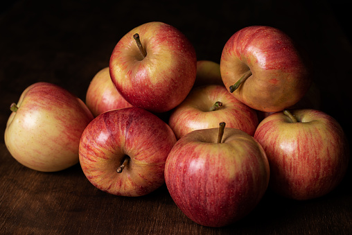 Still life of apples of the Royal Gala variety.