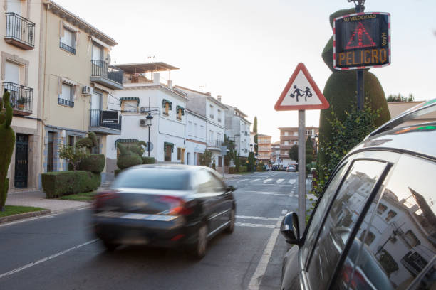 istock Vehicule crossing close to radar speed sign pole 1420747428