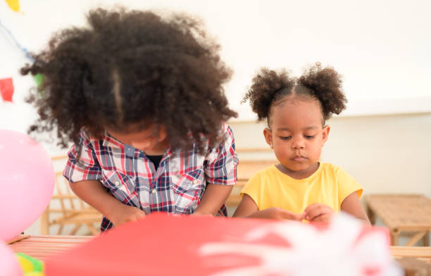 istock Two little girls Playing with plasticine 1420751444
