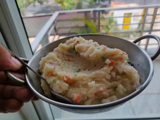 Photo of Upma, uppumavu, or uppittu is a dish originating from the Indian subcontinent