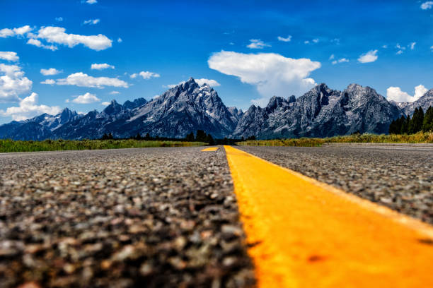 The main highway toward the iconic Teton Range in Grand Teton National Park, Wyoming, USA.