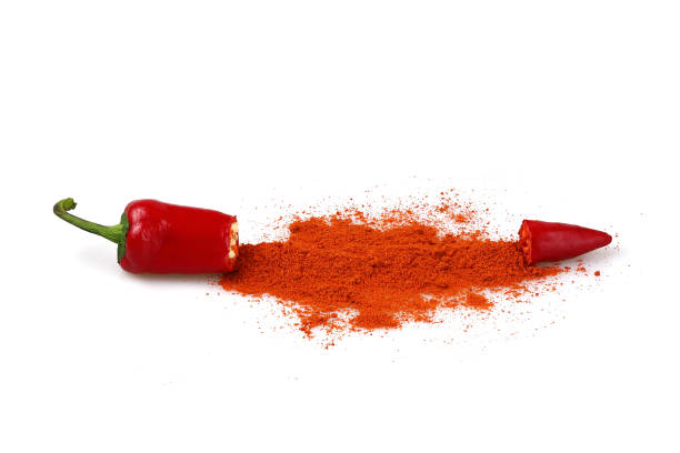 istock Red pepper partially ground, isolated on white background 1420753657