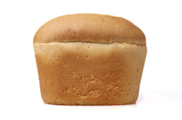 istock Loaf of white wheat bread isolated on white background 1420753667