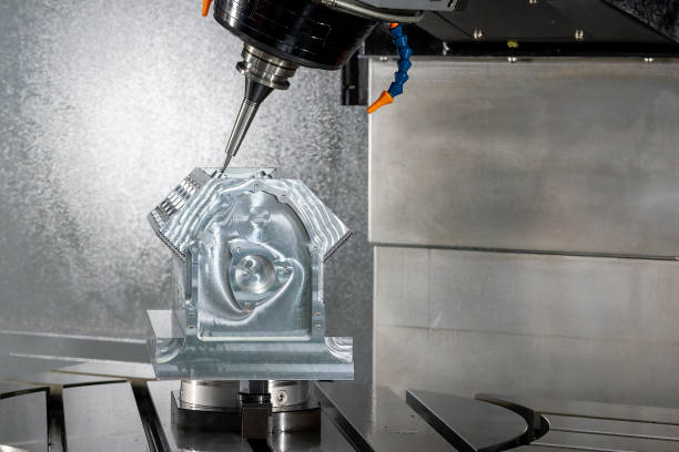 istock The 5-axis machining center cutting the V8 cylinder block with solid ball end mill tool. 1420755751
