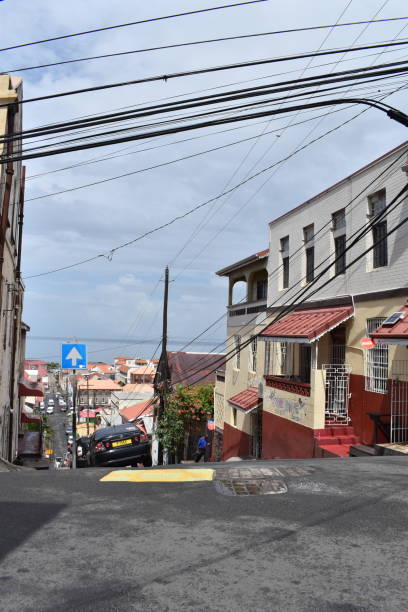 Market Hill, St. George's, Grenada St. George, Grenada- August 23, 2022 - Market Hill, a steep street road in the capital city of Grenada. hurricane ivan stock pictures, royalty-free photos & images