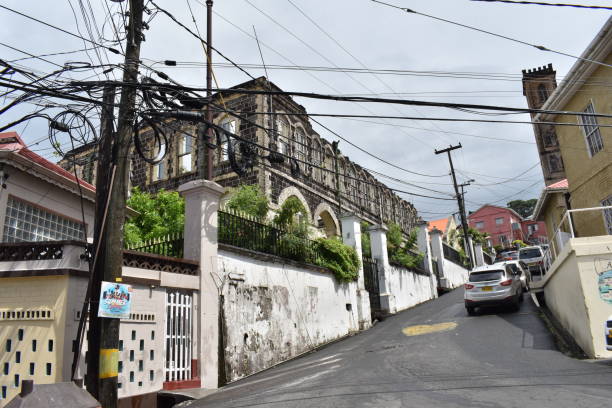Landmarks on Church Street, St. George's, Grenada St. George's, Grenada - August 23, 2022 - Landmarks on Church Street including the Former House of Parliament or York House on Church Street. This building was built using Georgian inspired architecture in the 1780s. However, it was destroyed by Hurricane Ivan in 2004. hurricane ivan stock pictures, royalty-free photos & images