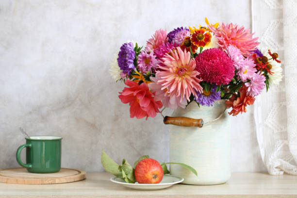 istock Cottage still life with autumn bouquet and apple. 1420762124