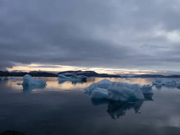 Photo of The iceberg filled waters of the Tunulliarfik and Sermilik Fjords on the shores of the port settlement of Narsaq, Southern Greenland