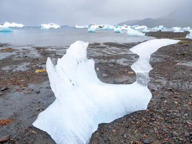 Photo of Stranded icebergs on the shores of the port settlement of Narsaq, Southern Greenland