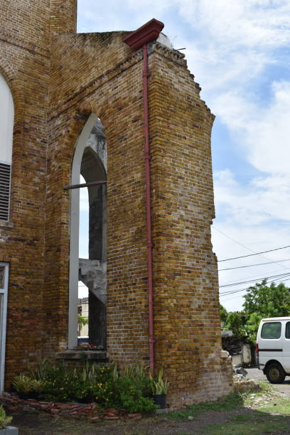 The St. Andrew's Presbyterian Church in St. George's, Grenada St. George's, Grenada - August 23, 2022 - The St. Andrew's Presbyterian Church or Scot Kirk which was opened in the year 1833. However, the historic building was damaged by Hurricane Ivan in 2004. In 2018, reconstruction activities began on the church's building. hurricane ivan stock pictures, royalty-free photos & images